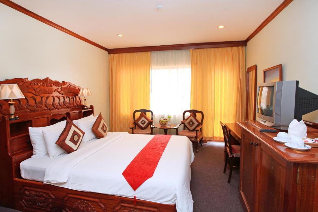 Angkor Hotel Siem Reap Quarto foto